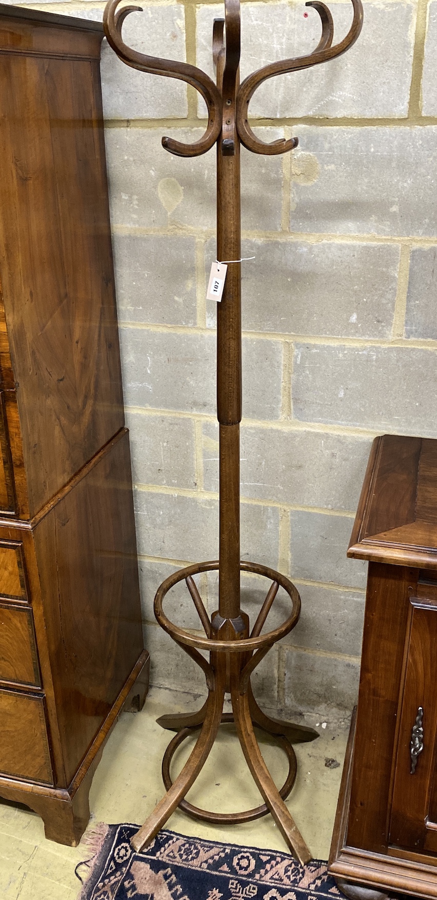 A beech bentwood coat and stick stand, height 179cm